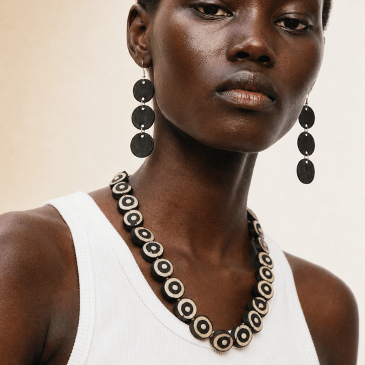 BEVERLY SMART EI Princesa Oeil Collier en perles plates d’os artisanal