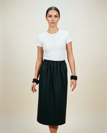Handcrafted long straight skirt with back split and elasticated waist from Beverly Smart's artisanal designer fashion collection