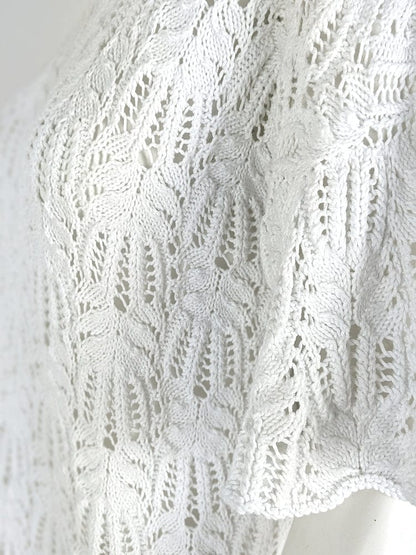 Handknitted white lacy top in 100% cotton from Beverly Smart's artisanal designer fashion collection